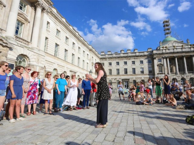 Part of the public programme at Somerset House, a choir sings water songs, London, 2014