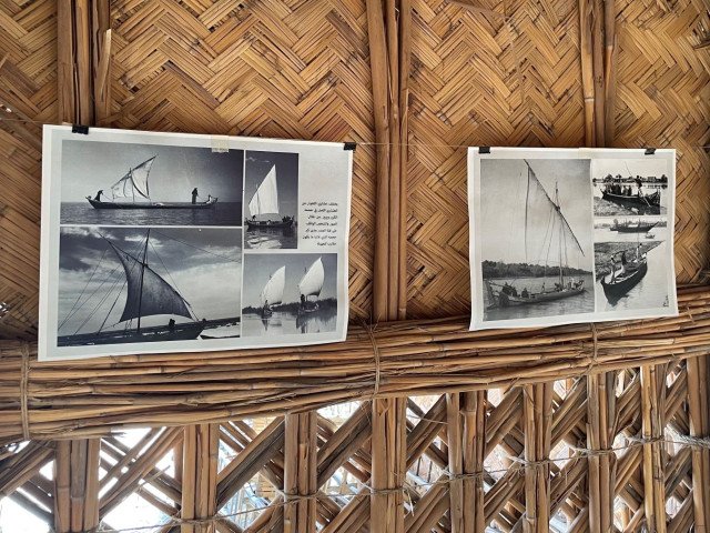 Reproductions of archival photography on display, Basra, Iraq (Hannah Lewis / © Safina Projects, 2023)