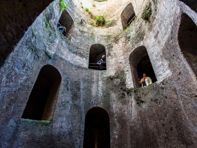 Interior of the Well of San Patrizio with visitors, 2022