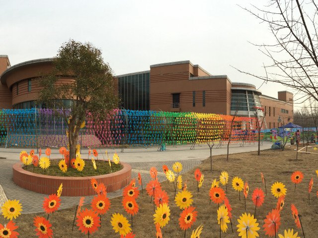 Colorful Windmill Show in outside park of the YRM in 2017, photo by Zhu Weidong