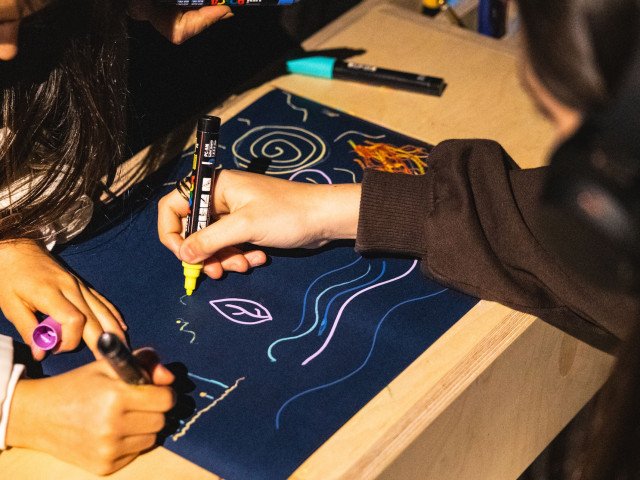 Visitors engaging with Nikki Lindt's artwork. Credits: Sofia Matos Silva